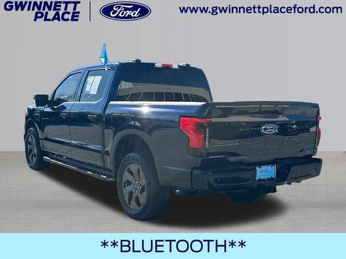 Certified 2023 Ford F150 Lightning XLT w/ Equipment Group 312A High image 7
