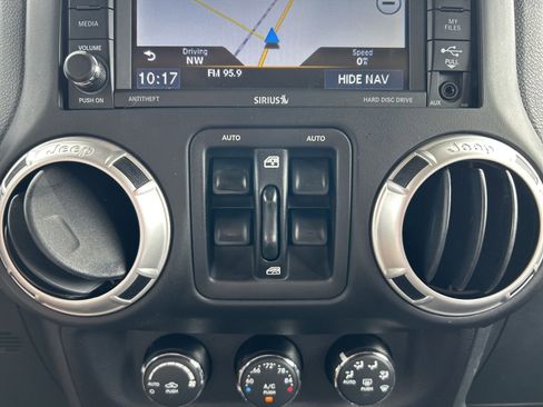 Certified 2016 Jeep Wrangler Unlimited Rubicon w/ Dual Top Group image 31