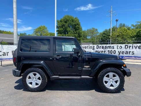 Used 2011 Jeep Wrangler Sahara w/ Dual Top Group AWD/4WD image 2