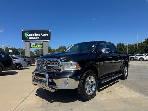 Used 2015 RAM 1500 Laramie w/ Convenience Group AWD/4WD image 1