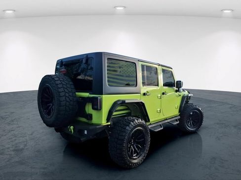 Used 2016 Jeep Wrangler Unlimited Sahara w/ Dual Top Group AWD/4WD image 6