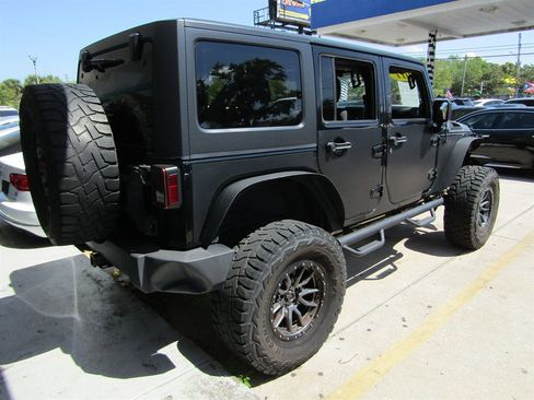 Used 2011 Jeep Wrangler Unlimited Sport w/ PWR Convenience Group AWD/4WD image 4