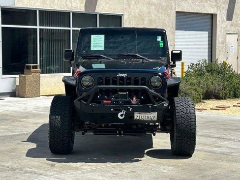 Used 2009 Jeep Wrangler Unlimited Rubicon w/ Dual Top Group AWD/4WD image 2