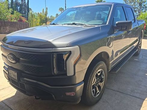 Used 2023 Ford F150 Lightning XLT AWD/4WD image 1