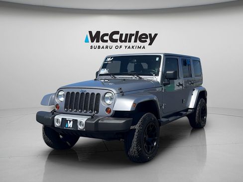 Used 2013 Jeep Wrangler Unlimited Sahara w/ Connectivity Group AWD/4WD image 1