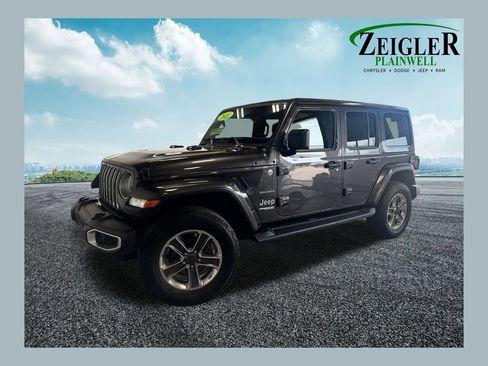 Used 2021 Jeep Wrangler Unlimited Sahara w/ Uconnect 4C Nav & Sound Group AWD/4WD image 1