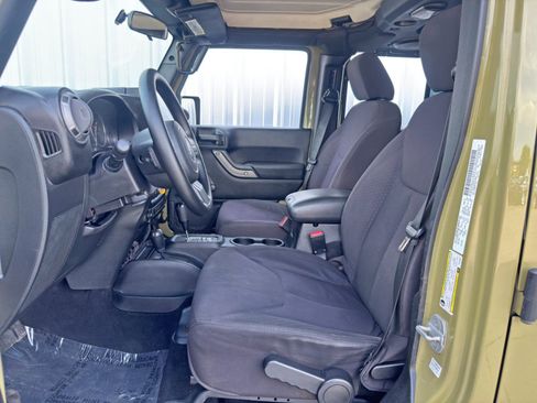 Used 2013 Jeep Wrangler Unlimited Sport w/ Mopar Black Appearance Group image 15