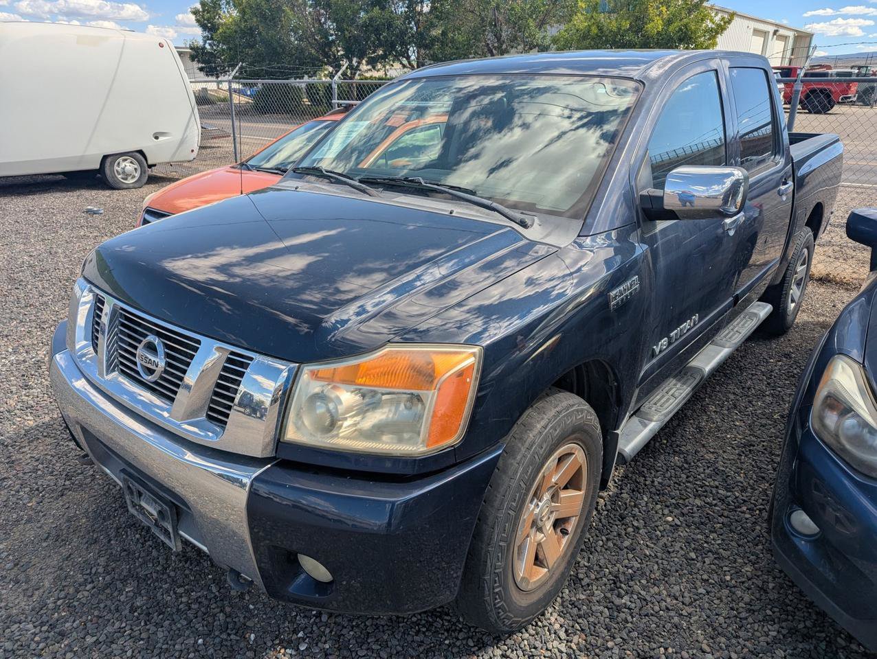 Used 2011 Nissan Titan SV w/ SV Value Truck Pkg AWD/4WD image 1
