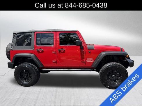 Used 2011 Jeep Wrangler Unlimited Sport w/ Trailer Tow Group AWD/4WD image 4