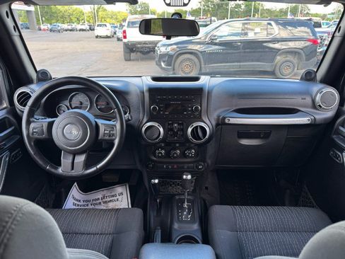 Used 2012 Jeep Wrangler Unlimited Sahara w/ Dual Top Group AWD/4WD image 21