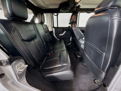 Used 2013 Jeep Wrangler Unlimited Sahara w/ Dual Top Group image 22