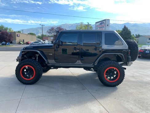 Used 2010 Jeep Wrangler Unlimited Rubicon w/ Dual Top Group image 3