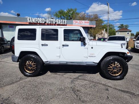 Used 2012 Jeep Wrangler Unlimited Sahara w/ Trailer Tow Group AWD/4WD image 3