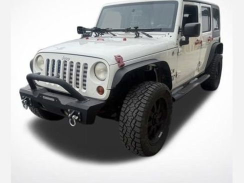 Used 2009 Jeep Wrangler Unlimited X AWD/4WD image 1