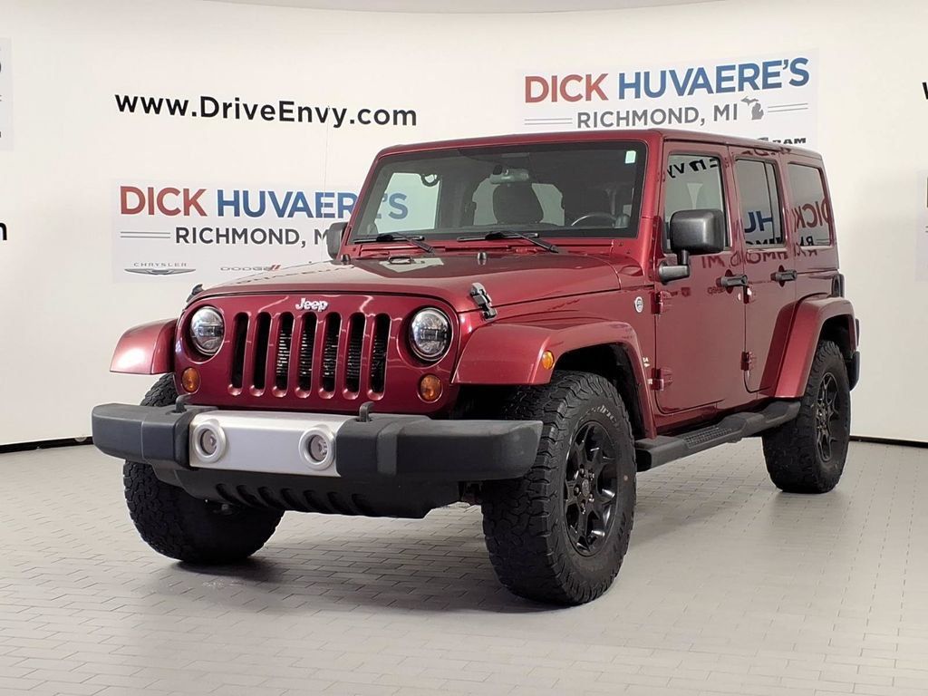 Used 2012 Jeep Wrangler Unlimited Sahara w/ Trailer Tow Group AWD/4WD image 1