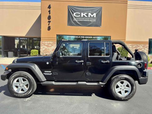 Used 2013 Jeep Wrangler Unlimited Sport AWD/4WD image 8