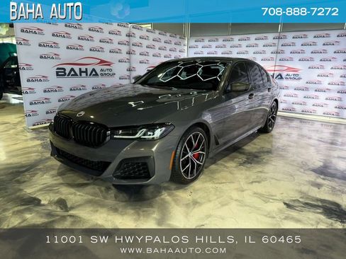 Used 2023 BMW M550i xDrive w/ Dynamic Handling Package image 1