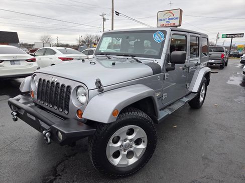 Used 2013 Jeep Wrangler Unlimited Sahara w/ Dual Top Group image 2