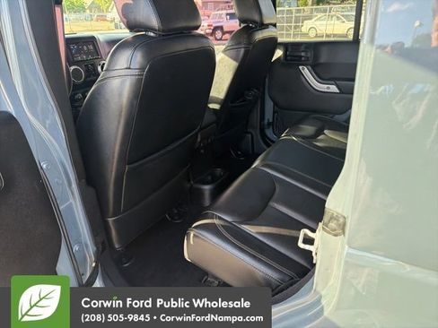 Used 2014 Jeep Wrangler Unlimited Sahara w/ Dual Top Group AWD/4WD image 28