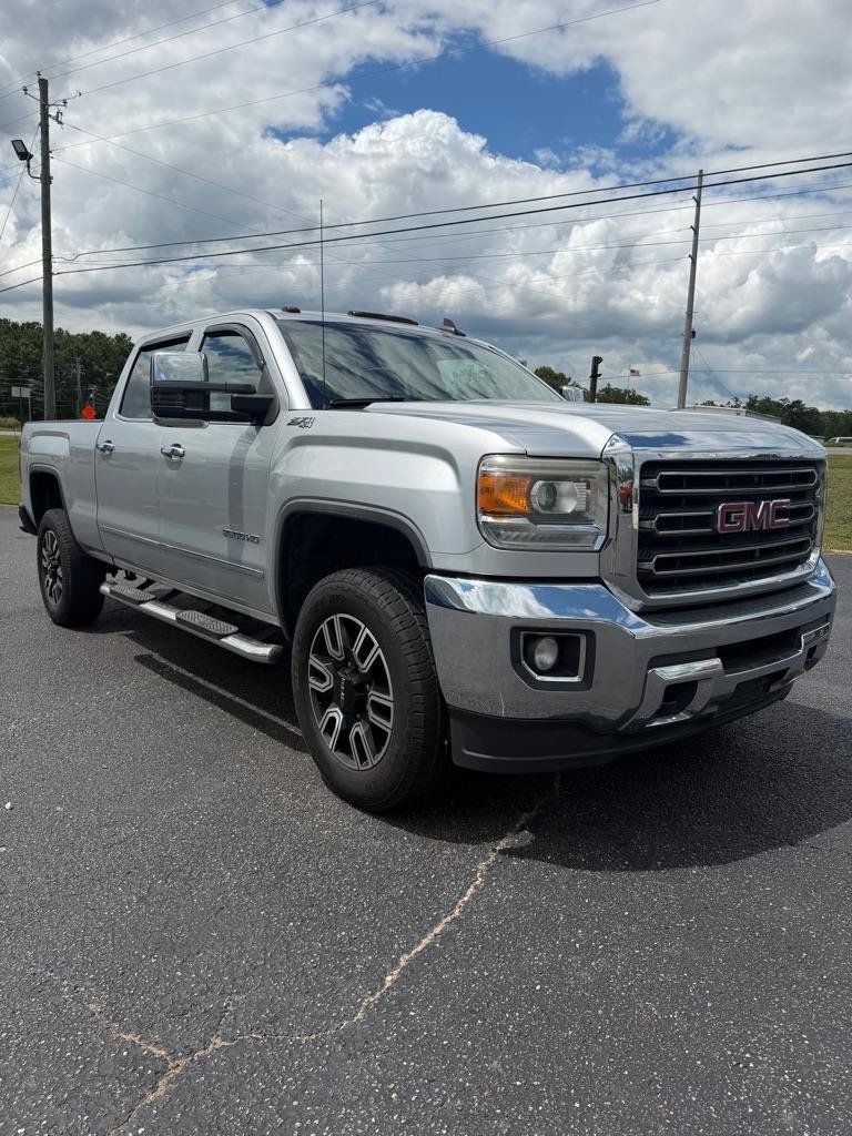 Used 2017 GMC Sierra 2500 SLT w/ Suspension Package, Off-Road AWD/4WD image 1