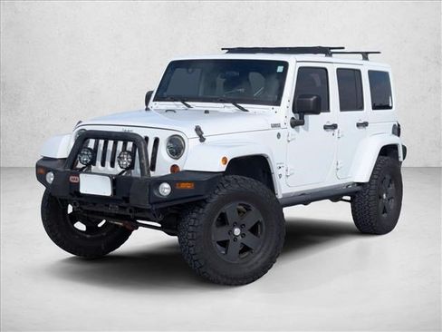 Used 2012 Jeep Wrangler Unlimited Sahara w/ Connectivity Group AWD/4WD image 1