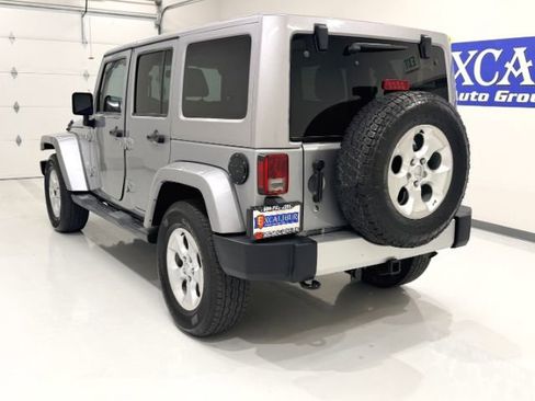Used 2014 Jeep Wrangler Unlimited Sahara w/ Max Tow Package AWD/4WD image 9