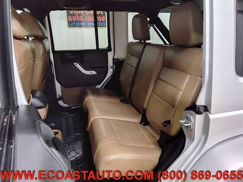 Used 2012 Jeep Wrangler Unlimited Sahara w/ Dual Top Group AWD/4WD image 13