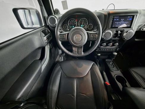 Used 2013 Jeep Wrangler Unlimited Sahara w/ Dual Top Group AWD/4WD image 13