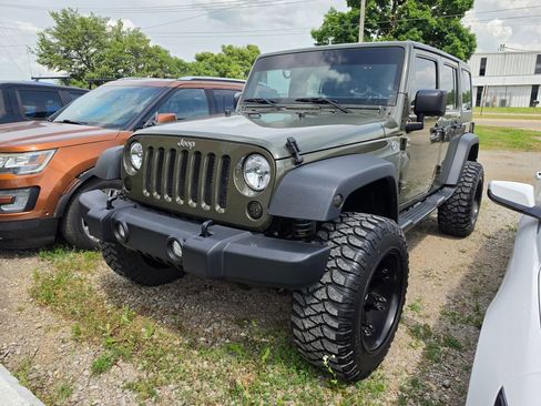 Used 2015 Jeep Wrangler Unlimited Sport AWD/4WD image 1