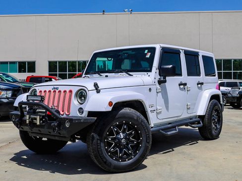 Used 2017 Jeep Wrangler Unlimited Sahara AWD/4WD image 1