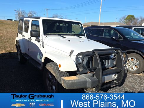 Used 2015 Jeep Wrangler Unlimited Sahara image 1