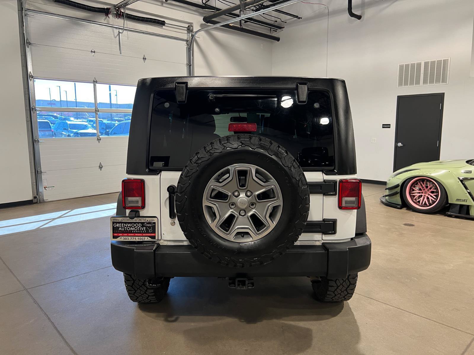 Used 2014 Jeep Wrangler Unlimited Rubicon w/ Dual Top Group AWD/4WD image 4