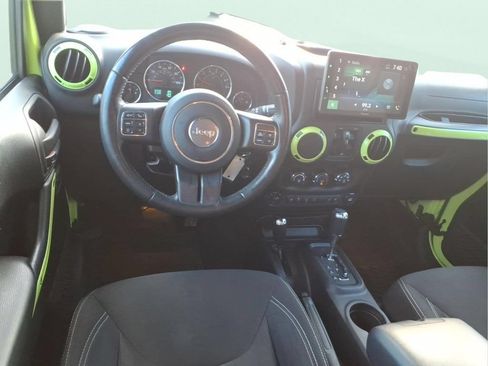 Used 2016 Jeep Wrangler Unlimited Sahara w/ Dual Top Group AWD/4WD image 13