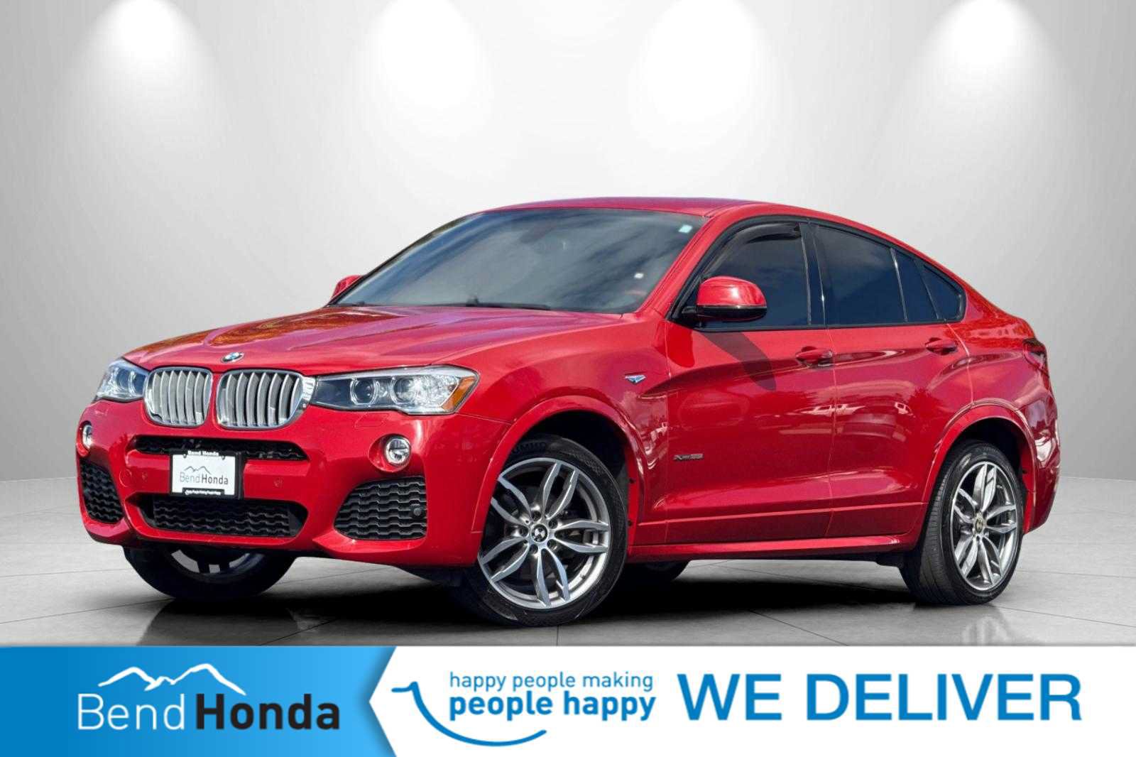 Used 2016 BMW X4 xDrive35i AWD/4WD image 1