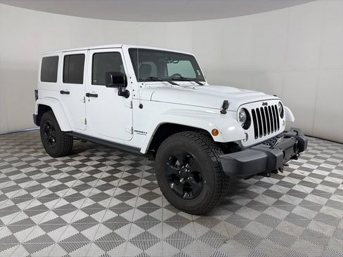 Used 2015 Jeep Wrangler Unlimited Sahara AWD/4WD image 1