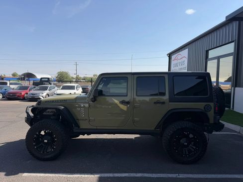 Used 2013 Jeep Wrangler Unlimited Rubicon w/ Dual Top Group AWD/4WD image 4