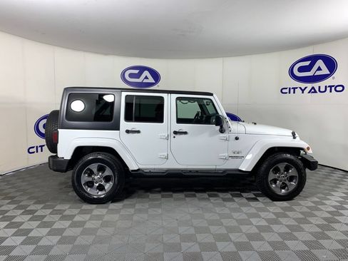 Used 2016 Jeep Wrangler Unlimited Sahara w/ Dual Top Group AWD/4WD image 2