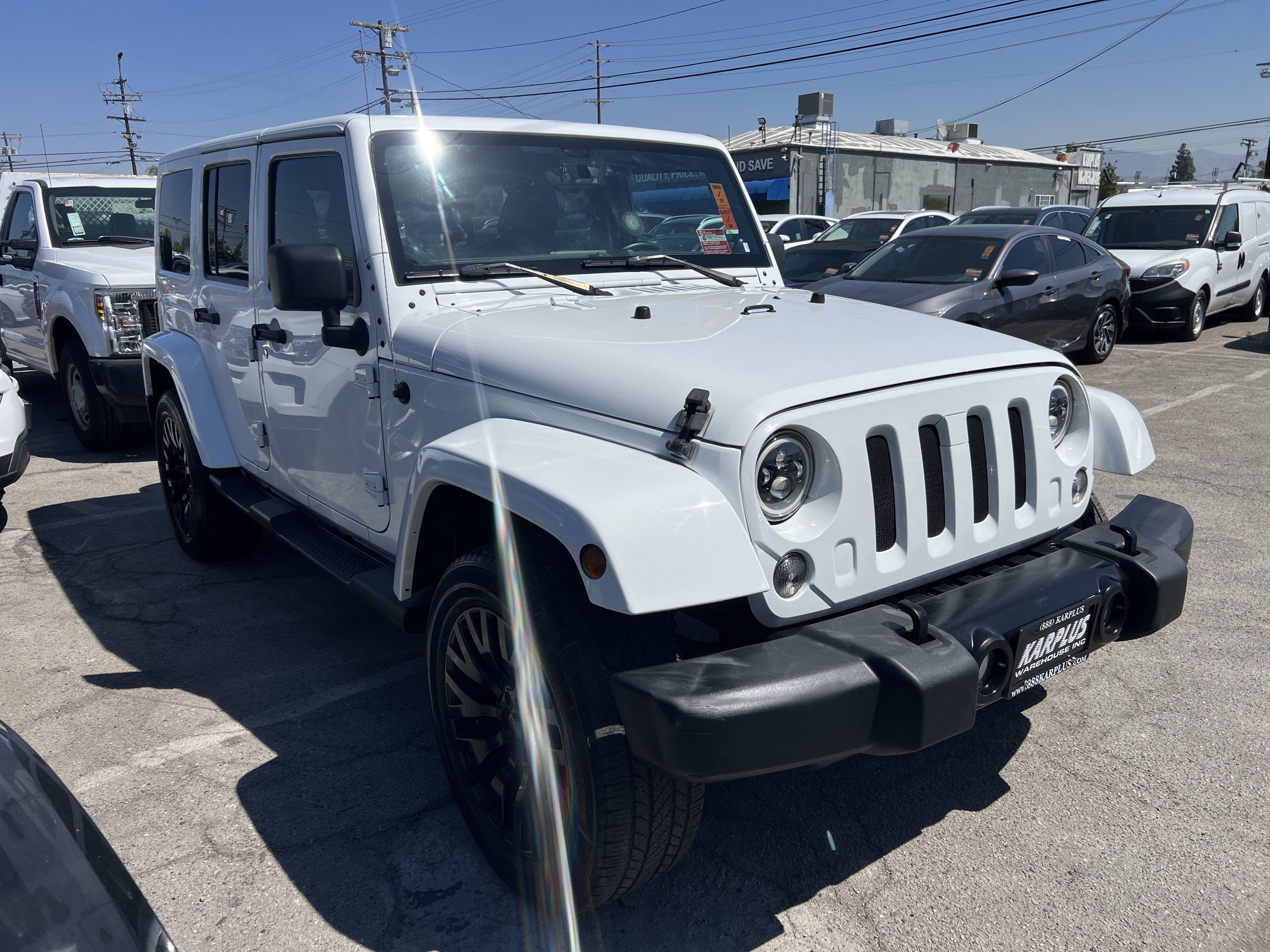 Used 2014 Jeep Wrangler Unlimited Sahara w/ Dual Top Group AWD/4WD image 7