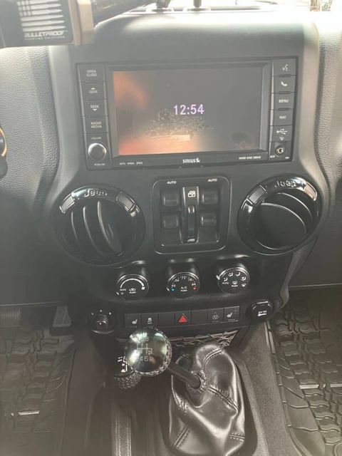 Used 2014 Jeep Wrangler Unlimited Sahara AWD/4WD image 14