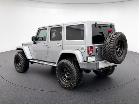 Used 2014 Jeep Wrangler Unlimited Sahara w/ Mopar Chrome Edition Group AWD/4WD image 3