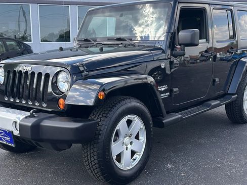 Used 2011 Jeep Wrangler Unlimited Sahara AWD/4WD image 1