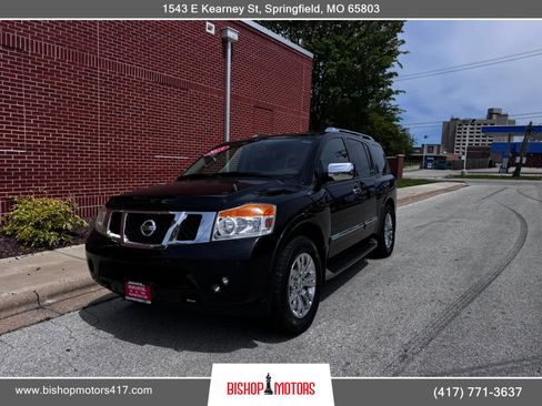 Used 2015 Nissan Armada Platinum w/ 2nd Row Captain Seat Package AWD/4WD image 1