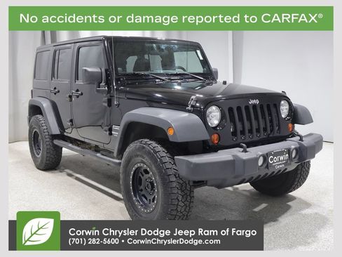 Used 2013 Jeep Wrangler Unlimited Sport w/ Max Tow Pkg AWD/4WD image 1