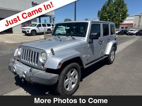 Used 2012 Jeep Wrangler Unlimited Sahara w/ Connectivity Group AWD/4WD image 1