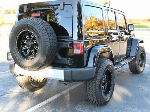 Used 2015 Jeep Wrangler Unlimited Sahara w/ Dual Top Group AWD/4WD image 11