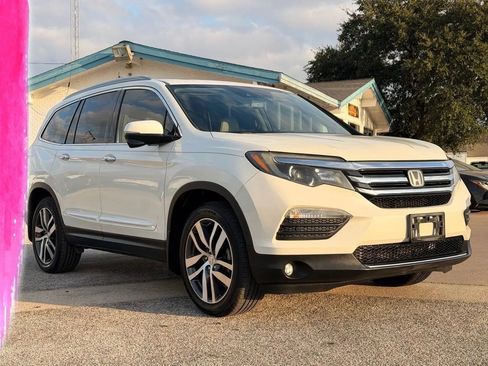 Used 2016 Honda Pilot Touring image 1