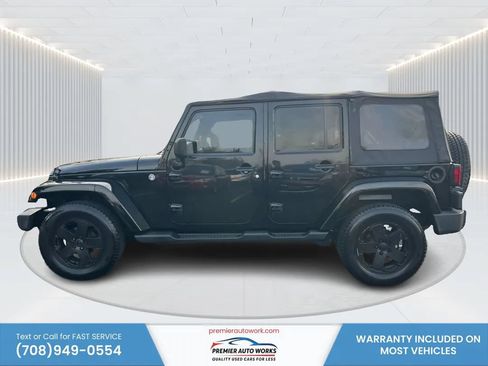 Used 2012 Jeep Wrangler Unlimited Sahara w/ Connectivity Group AWD/4WD image 9