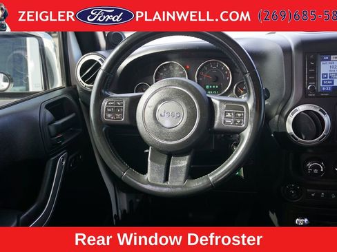 Used 2012 Jeep Wrangler Unlimited Sahara w/ Dual Top Group AWD/4WD image 13