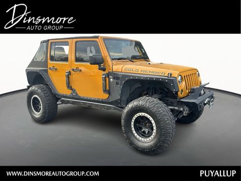 Used 2014 Jeep Wrangler Unlimited Rubicon w/ Dual Top Group AWD/4WD image 1