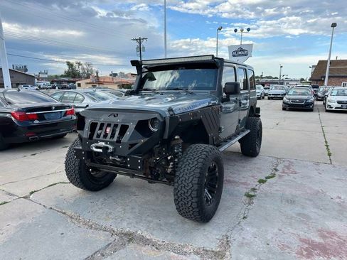 Used 2014 Jeep Wrangler Unlimited Rubicon w/ Connectivity Group AWD/4WD image 3